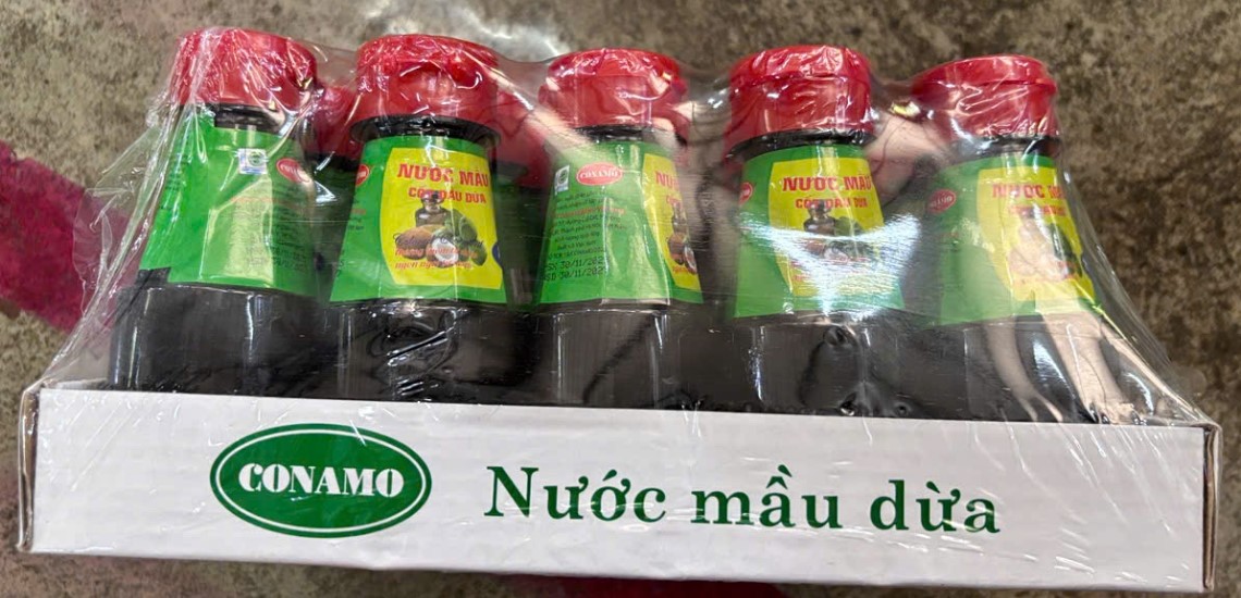 Vỉ nước màu dừa Conamo 12 lọ (80g)